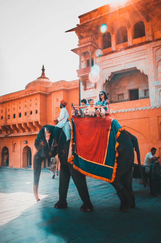 pexels-photo-2870167-2870167 Tourists enjoying an elephant ride at Amber Fort in Jaipur, capturing vibrant Indian architecture and culture.